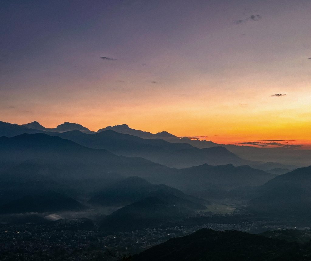 Hazy morning view of Annapurna mountains at sunrise from Pokhara, Nepal.